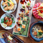 raisu izakaya on west 4th seafood donburi and japanese food spread flatlay