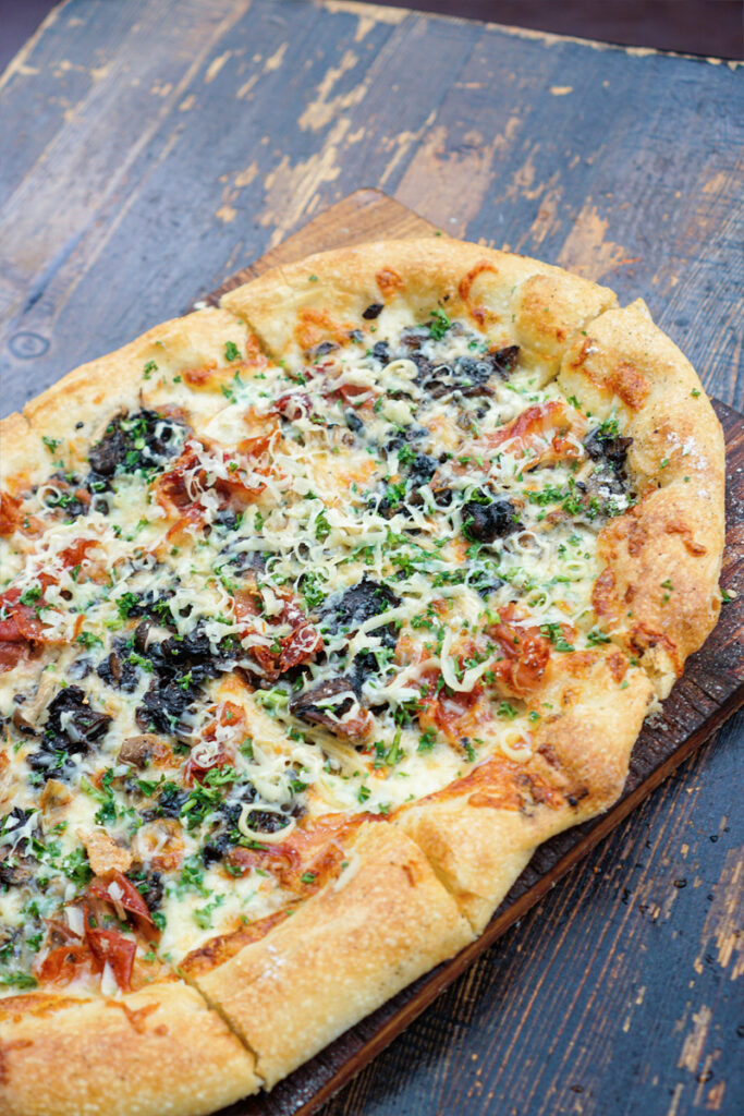 The Parlour Restaurant in Yaletown 50% off bottles of wine best pizza in yaletown I'm a fungi mushroom pizza