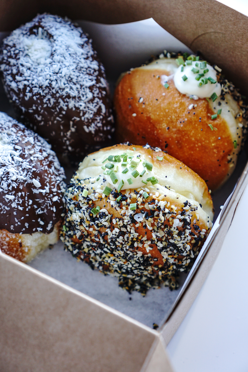 Everything Bagel Donut at mello Vancouver is a soft and fluffy brioche donut filled with a chive cream cheese filling