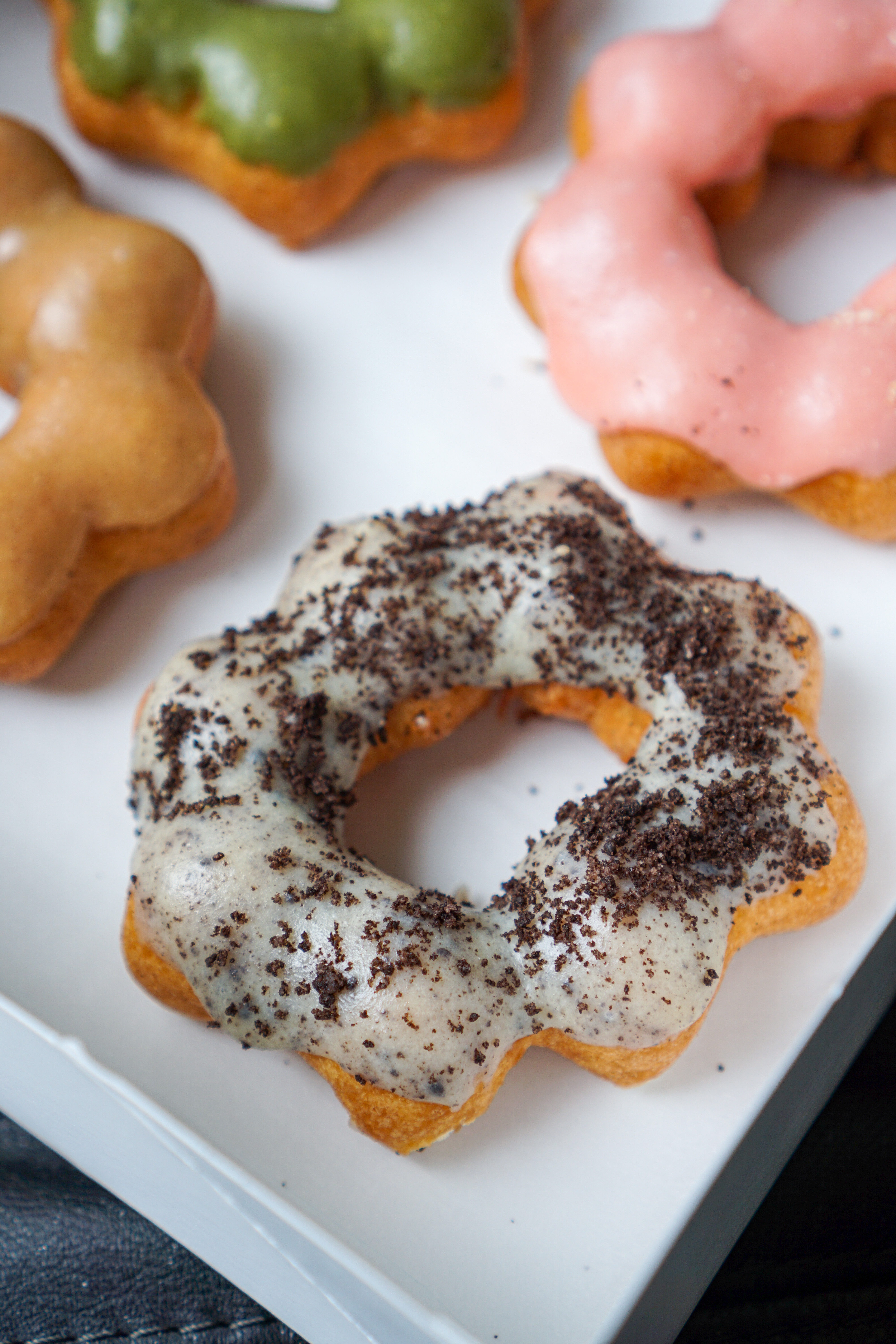 holy mochi donuts new spot for mochi donuts in metro vancouver Cookies and cream white glaze donuts with oreo cookie crumbles