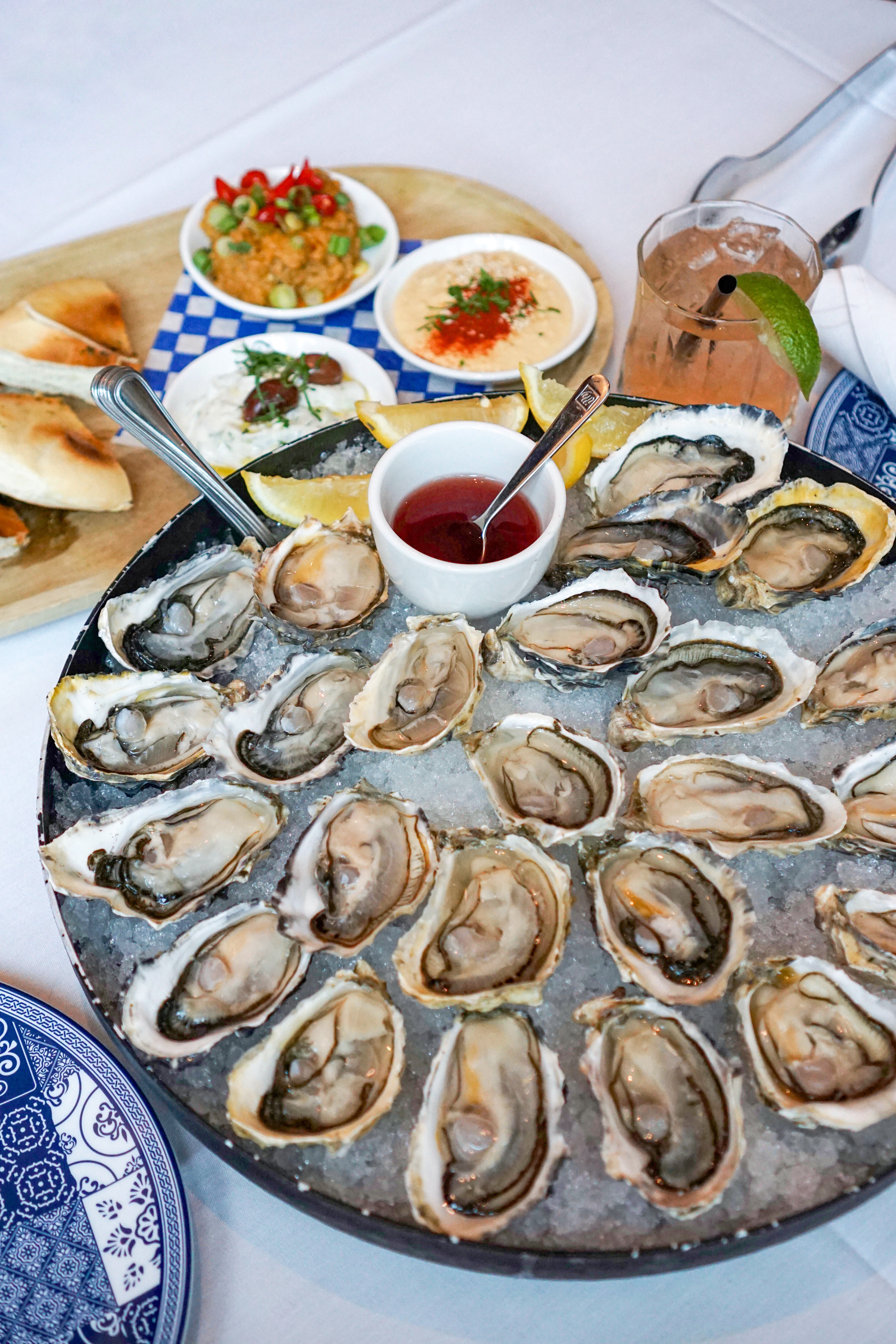 Hydra Estiatorio Best Buck-A-Shuck Oysters in Downtown Vancouver Happy Hour one dollar oysters