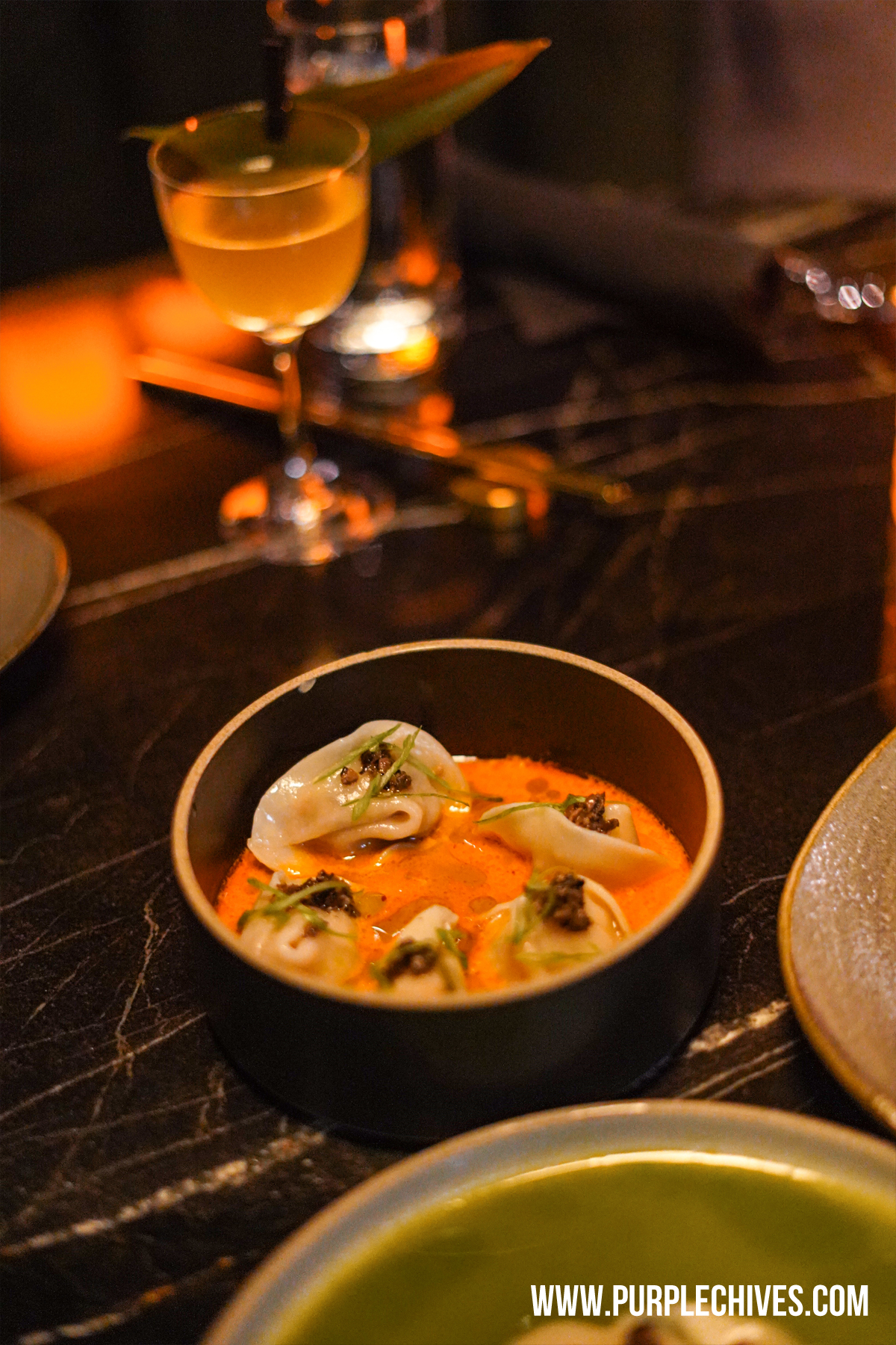 Jungle Room Vancouver's first jungle-inspired restaurant and cocktail lounge elevated Indonesian and Japanese street food Downtown Vancouver West End Laksa Bombs Prawn and Truffle Dumpling with Lobster Laksa Broth