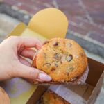 mello donukie new donut cookie treat in vancouver must try donuts in vancouver vancouver donuts chocolate chip cookie donut with chocolate chip cookie filling and topping