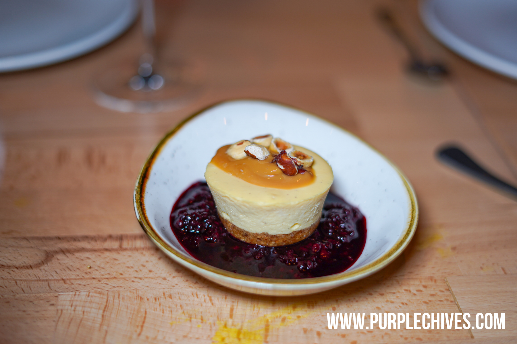 Ombre Tofino must try new restaurant in Tofino lemon dulce cheesecake with roasted hazelnuts and hazelnut crust and fruit compote